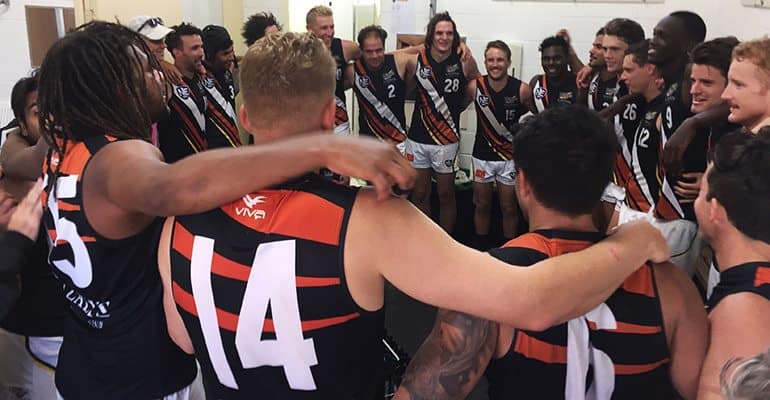 NT Thunder sing the song after a win