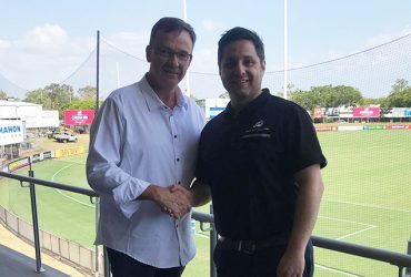 AFLNT CEO Michael Solomon and JS Sports Operations Manager shaking hands