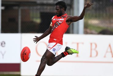Adam Tipungwuti in action for the Tiwi Bombers
