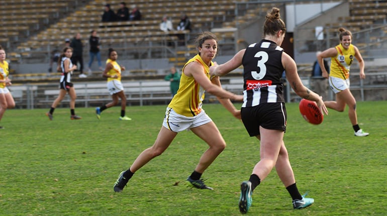 Angela Foley tries to stop Collingwood